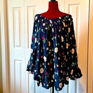 Terra and sky peasant blouse with flowers.